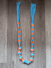 Load image into Gallery viewer, Dolly knot necklace (blue/orange stripe)
